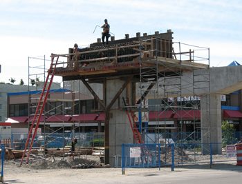 Workers frame up the support cross beams with rebar, which will be covered with concrete to form the support of the Aberdeen Station outbound platform.