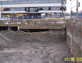 Following completion of construction for phase A of King Edward Station, traffic is shifted to the east side of Cambie street to allow for excavation of Phase B of the station. Centre section shows access point to and from trains.