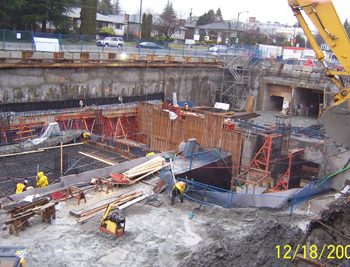 Base slab construction and cross-passage formwork (plywood). North end of the cut-and-cover tie-in with the station.