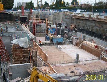 Formwork over cross-passage in preparation for track slab. Construction of column work for mezzanine.