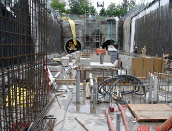 Bored tunnels on the north end of the station. Rebar for exterior walls prepared for 20 lm, 3-day cycle concrete pour. In total 358 tonnes of rebar was required for the station.