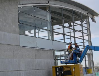 Glazing is installed at the entrance to the outbound platform.