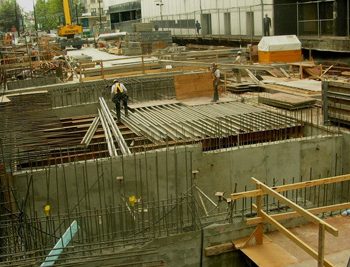 Joist and plywood falsework for the roof slab. Completion of deck to accept concrete roof slabs.
