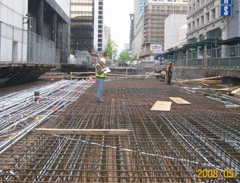 Rebar and conduit work were completed prior to the roof slab concrete pour. In total four pours were necessary to complete the station roof.