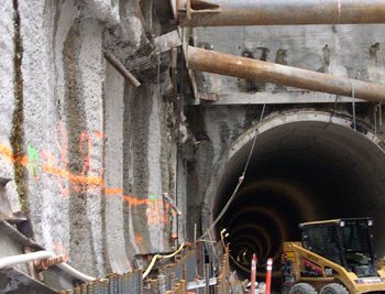 Exposed rebar for exterior walls frames the base slab entrance to one of two bored tunnels 6.1 meters in diameter, on the west side of the station. In total 667 tonnes of rebar was used to build Yaletown-Roundhouse Station.
