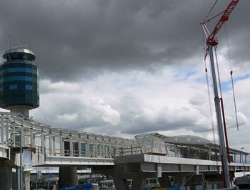 The walkway linking the terminal to the YVR-Airport Station under construction.